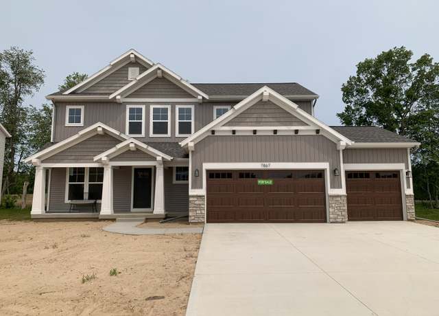 Property at 7867 Woodhurst Dr NE, Rockford, MI 49341, 4 beds, 2.5 baths