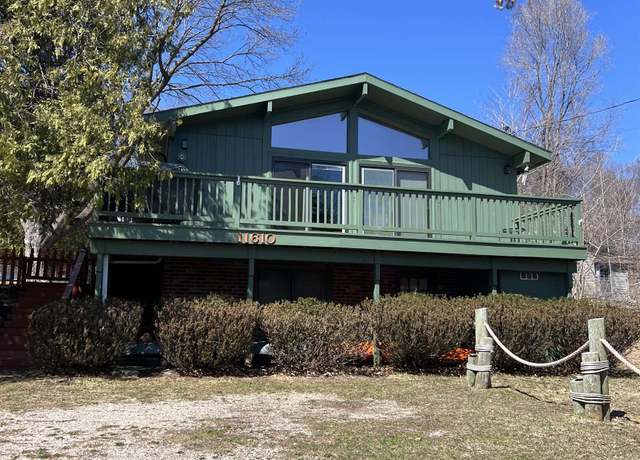 Property at 11610 SW Torch Lake Dr, Rapid City, MI 49676, 3 beds, 2 baths