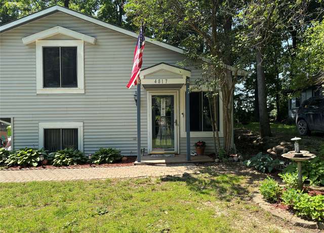 Property at 4817 Hickory Dr, Highland, MI 48356, 3 beds, 2 baths