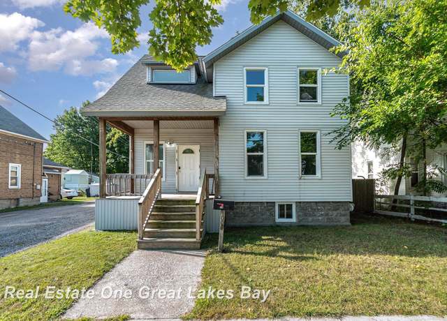 Property at 1006 Cass Ave, Bay City, MI 48708, 3 beds, 2 baths