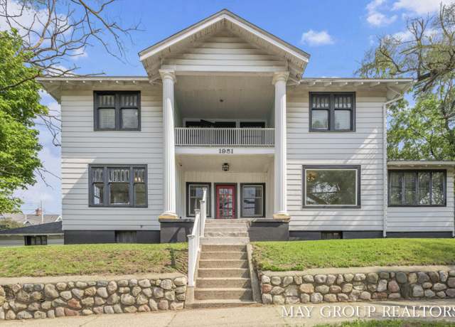 Property at 1951 Leonard St NW, Grand Rapids, MI 49504, 5 beds, 3 baths