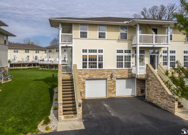 Property at 400 Beachwalk Trl, Luna Pier, MI 48157, 2 beds, 1.5 baths
