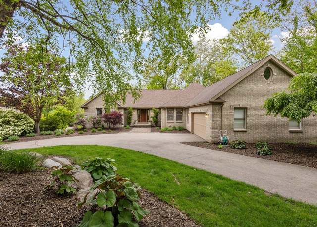 Property at 1450 Winterwood Dr NE, Grand Rapids, MI 49525, 5 beds, 3.5 baths