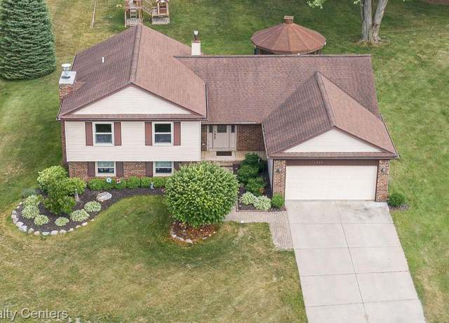 Property at 1306 Bishops Terrace Ter, Wixom, MI 48393, 5 beds, 2.5 baths