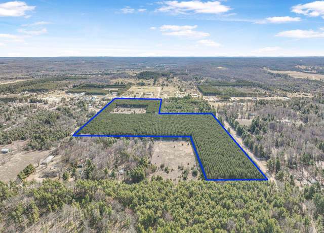 Property at 7020 NW Round Lake Rd, Rapid City, MI 49676
