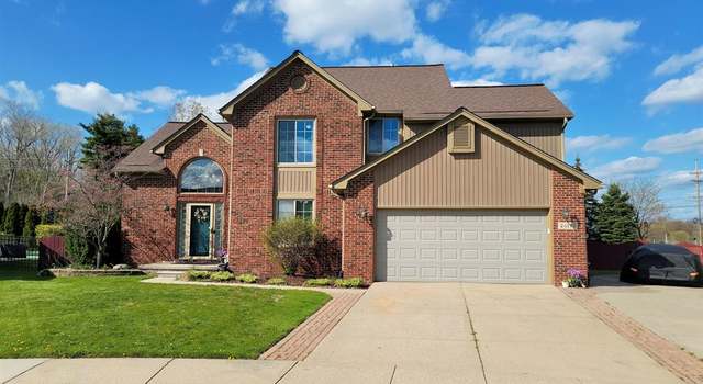 Photo of 24199 Pointe Dr, Macomb Twp, MI 48042