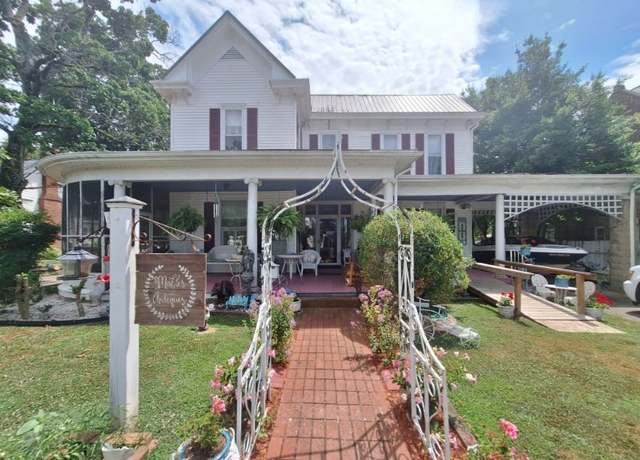 Property at 213 Pulaski St, Lawrenceburg, TN 38464, 5 beds, 2.5 baths