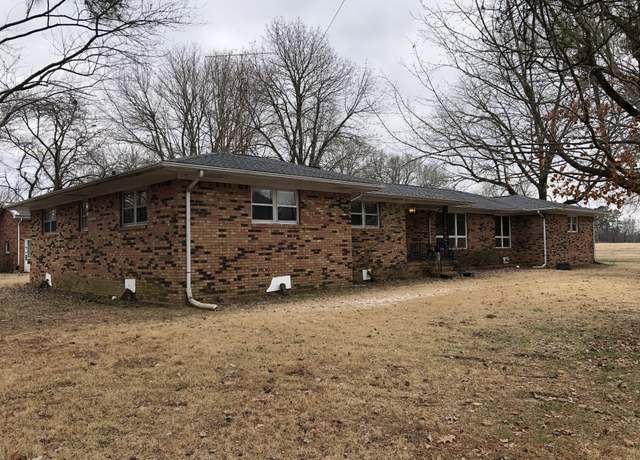 Property at 233 W Chestnut St, Puryear, TN 38251, 4 beds, 2 baths