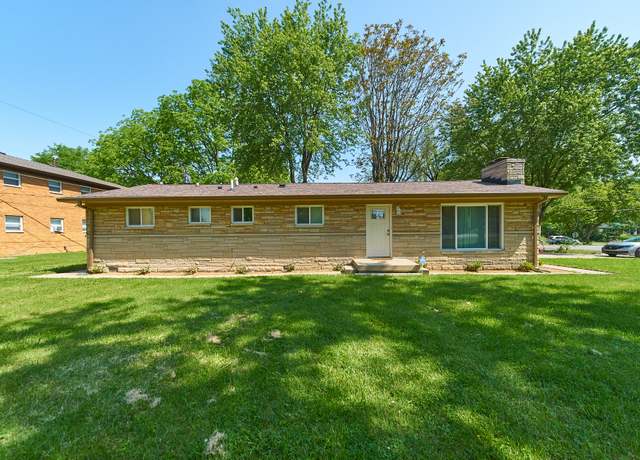 Property at 1108 N Ridgeview Dr, Indianapolis, IN 46219, 4 beds, 2 baths