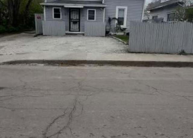 Property at 1722 N Parker Ave, Indianapolis, IN 46218, 4 beds, 2 baths