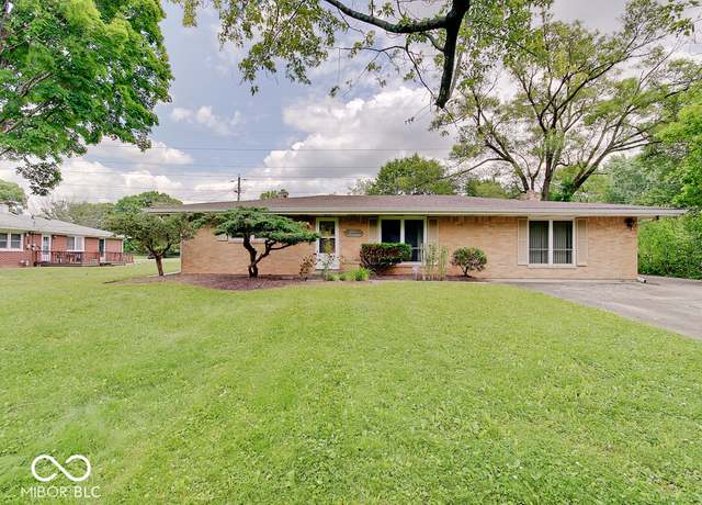 Property at 8071 Chiltern Dr, Indianapolis, IN 46268, 4 beds, 4 baths