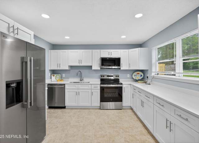 Property at 6952 Goldilocks Ln, Jacksonville, FL 32210, 4 beds, 2 baths