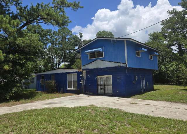 Property at 6669 Restlawn Dr, Jacksonville, FL 32208, 4 beds, 2 baths