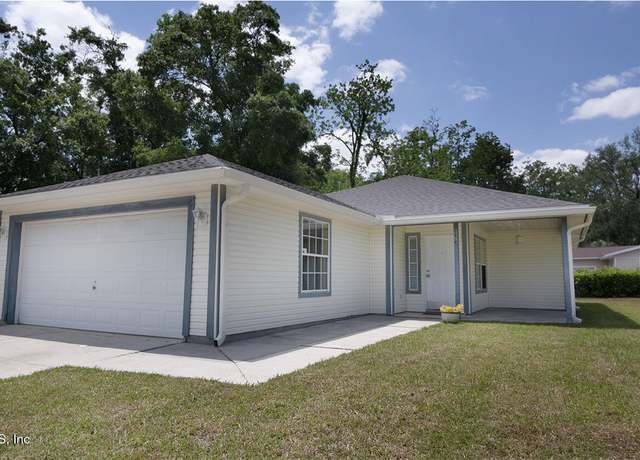 Property at 8878 Scott Woods Dr W, Jacksonville, FL 32208, 3 beds, 2 baths