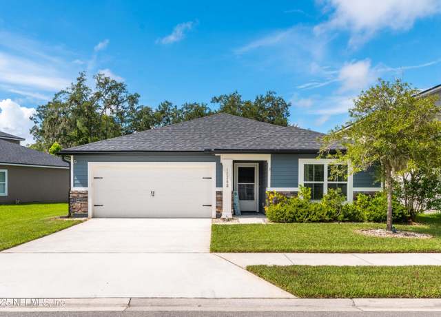 Property at 12390 Cherry Bluff Dr, Jacksonville, FL 32218, 3 beds, 2 baths