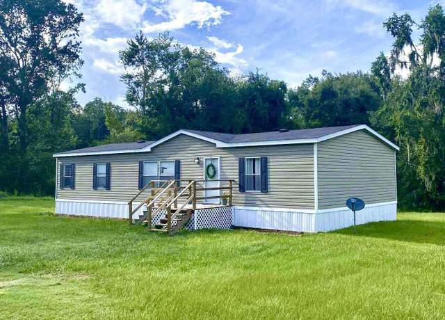 Property at 11232 D A Beasley Dr, Sanderson, FL 32087, 3 beds, 2 baths