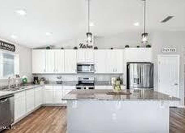 Property at 8540 Mc Glothlin St, Jacksonville, FL 32210, 4 beds, 2.5 baths