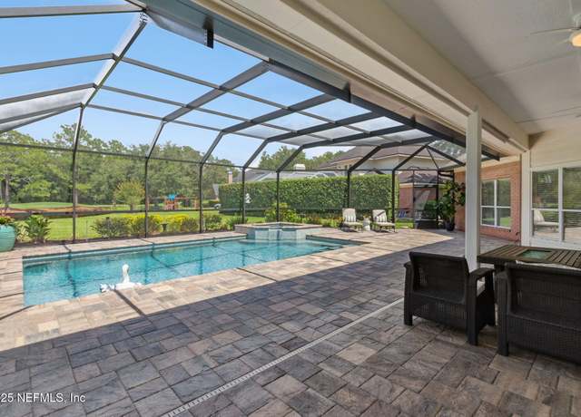 Property at 10065 Deercreek Club Rd E, Jacksonville, FL 32256, 4 beds, 3 baths