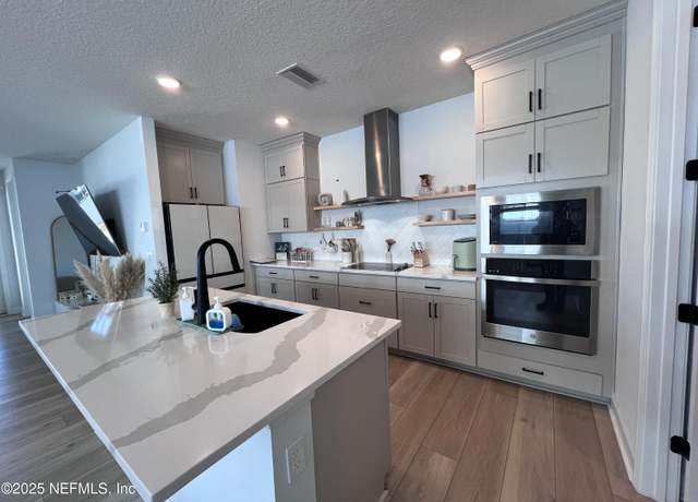 Property at 10009 Invention Ln, Jacksonville, FL 32256, 3 beds, 3 baths