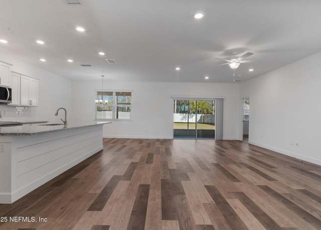 Property at 66 Westhampton Dr, Palm Coast, FL 32164, 4 beds, 3 baths