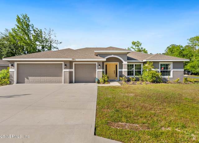 Property at 33 Ranwood Ln, Palm Coast, FL 32164, 4 beds, 2 baths