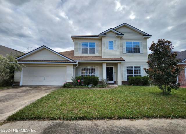 Property at 9194 Prosperity Lake Dr, Jacksonville, FL 32244, 4 beds, 3 baths