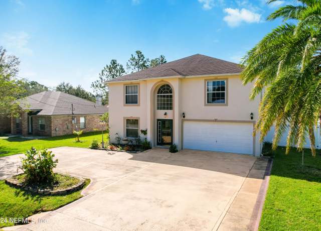 Property at 7 Buffalo Meadow Ln, Palm Coast, FL 32137, 4 beds, 3.5 baths