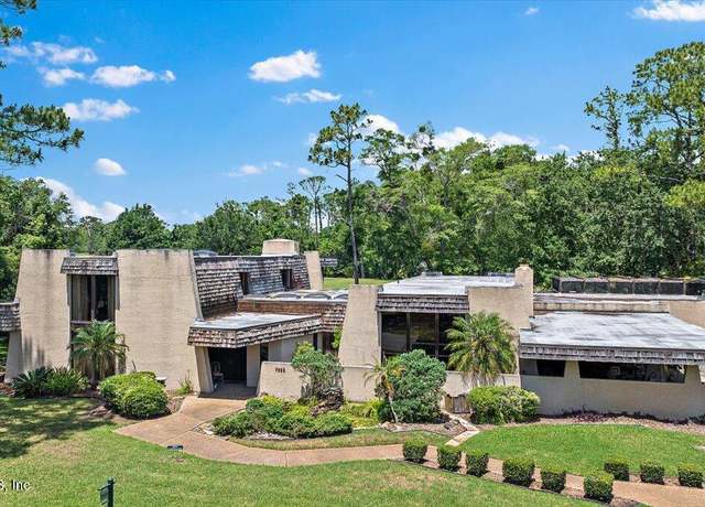 Property at 7868 Woodsdale Ln, Jacksonville, FL 32256, 5 beds, 3.5 baths