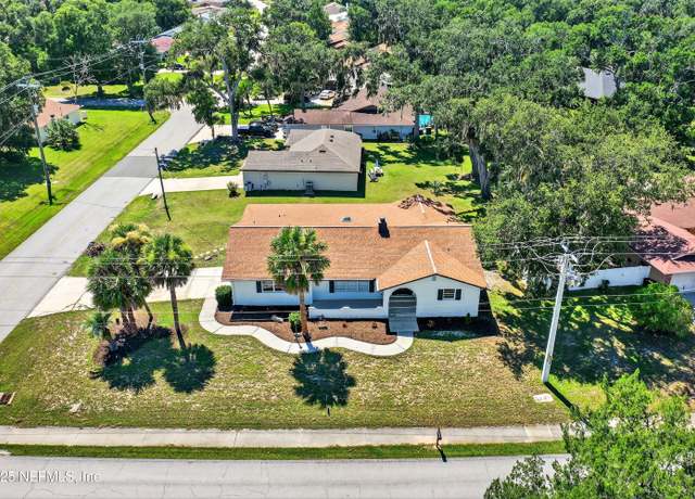 Property at 56 Florida Park Dr N, Palm Coast, FL 32137, 4 beds, 3 baths