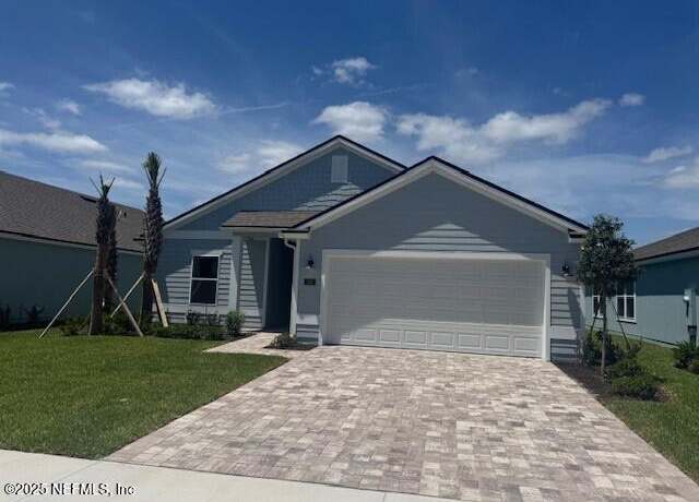 Property at 182 Greenwood Dr, Palm Coast, FL 32137, 3 beds, 2 baths