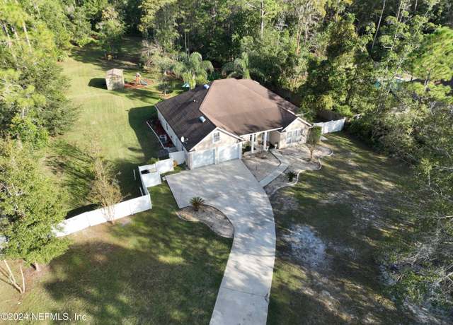 Property at 10237 McLaurin Rd E, Jacksonville, FL 32256, 4 beds, 3.5 baths