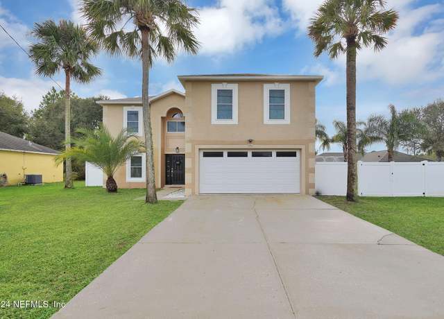 Property at 77 London Dr, Palm Coast, FL 32137, 5 beds, 2.5 baths