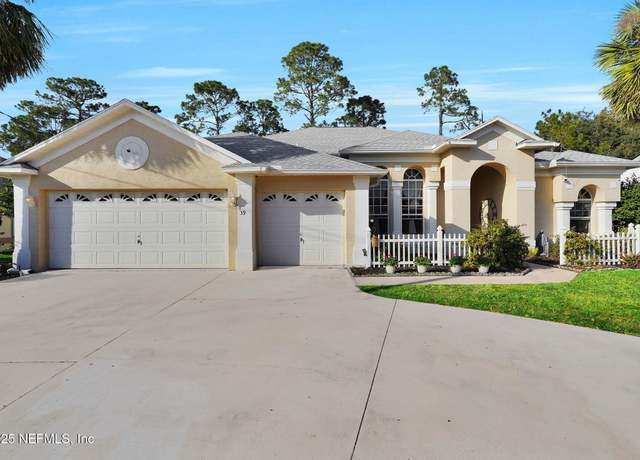 Property at 39 Woodhollow Ln, Palm Coast, FL 32164, 4 beds, 3 baths