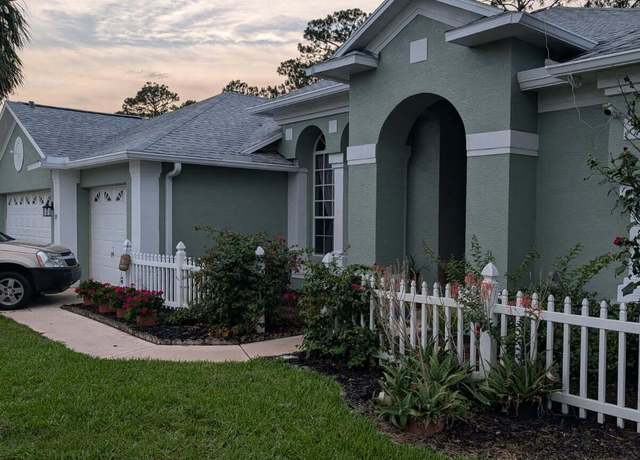 Property at 39 Woodhollow Ln, Palm Coast, FL 32164, 4 beds, 3 baths