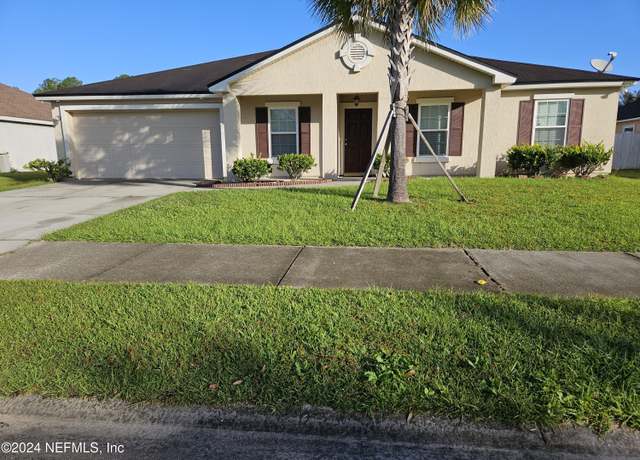Property at 6397 Pinewood Hills Dr, Jacksonville, FL 32218, 4 beds, 2 baths