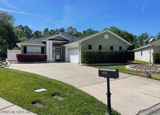 Property at 1831 Moss Creek Dr SW, Fleming Island, FL 32003, 3 beds, 2 baths