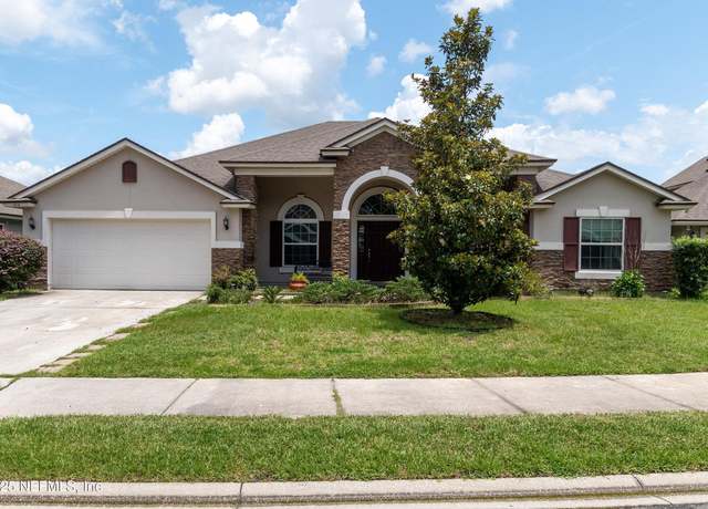 Property at 9819 Patriot Ridge Dr, Jacksonville, FL 32221, 4 beds, 2 baths