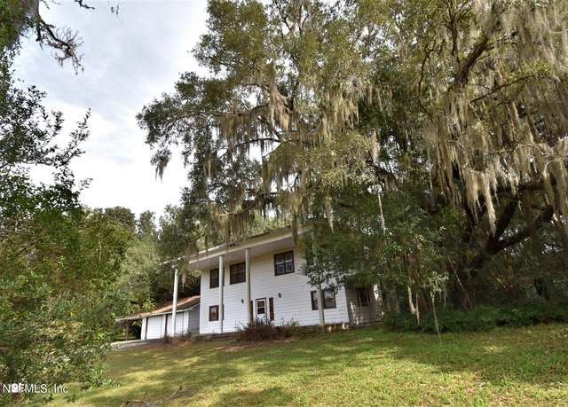 Property at 209 Carrier Rd, Crescent City, FL 32112, 4 beds, 3 baths