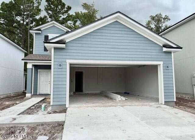 Property at 14914 MacAdamia Ln, Jacksonville, FL 32218, 4 beds, 3 baths