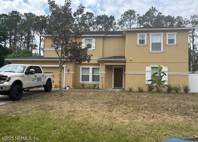 Property at 81 Panorama Dr, Palm Coast, FL 32164, 4 beds, 2.5 baths