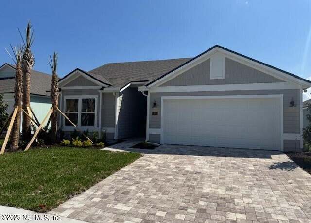 Property at 164 Greenwood Dr, Palm Coast, FL 32137, 4 beds, 2 baths
