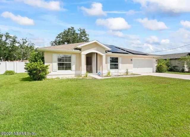 Property at 61 Zinnia Trl, Palm Coast, FL 32164, 4 beds, 2 baths