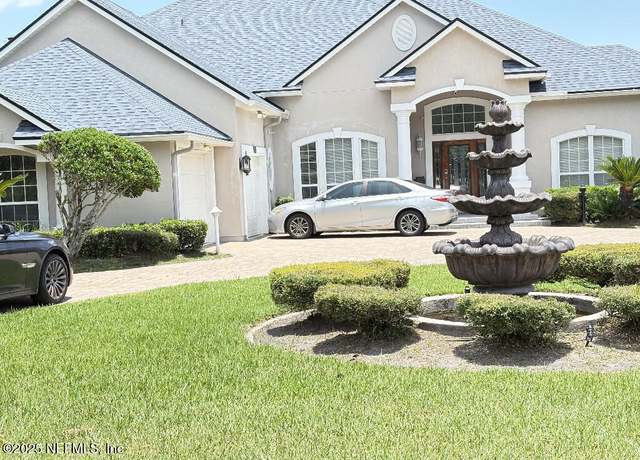 Property at 2560 Country Club Blvd, Orange Park, FL 32073, 5 beds, 4 baths