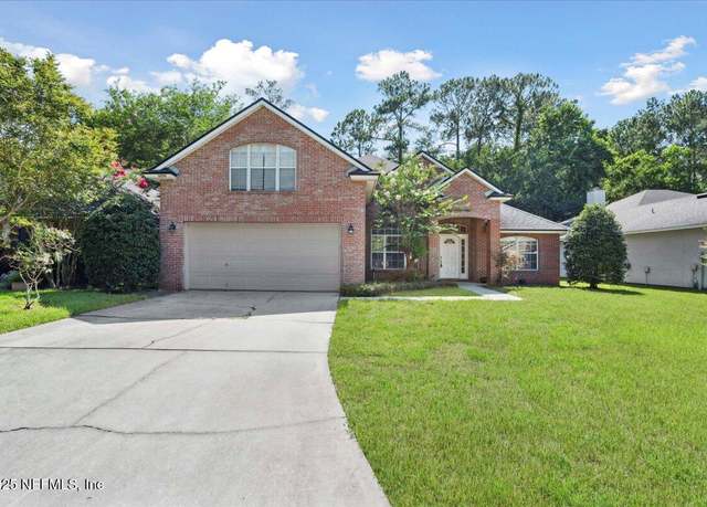 Property at 8898 Canopy Oaks Dr, Jacksonville, FL 32256, 4 beds, 3 baths
