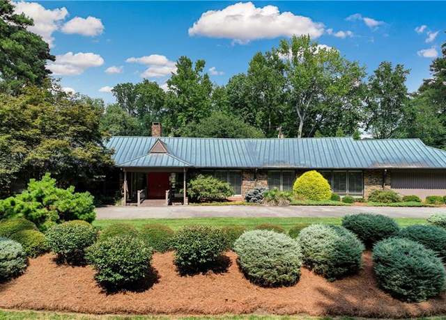 Property at 210 Kemp Rd E, Greensboro, NC 27410, 6 beds, 6.5 baths