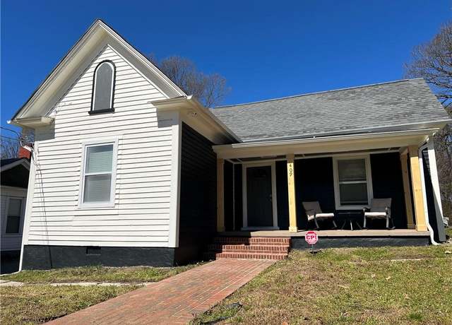 Property at 409 E Whittington St, Greensboro, NC 27406, 4 beds, 2 baths