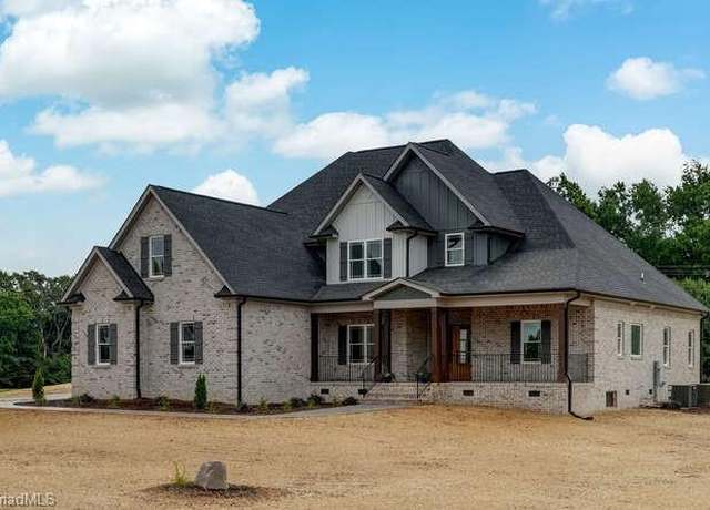 Property at 8301 Hunters Dr, Greensboro, NC 27455, 4 beds, 3.5 baths