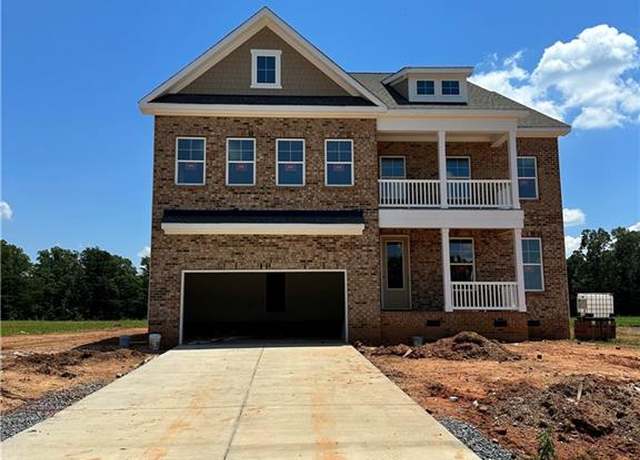 Property at 5504 Penguin Dr, Summerfield, NC 27358, 4 beds, 3.5 baths