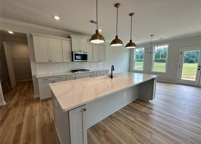 Property at 5504 Penguin Dr, Summerfield, NC 27358, 4 beds, 3.5 baths