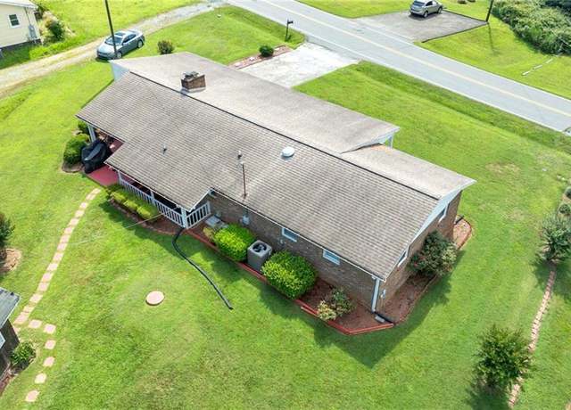 Property at 7121 Ridge Rd, Tobaccoville, NC 27050, 4 beds, 2 baths